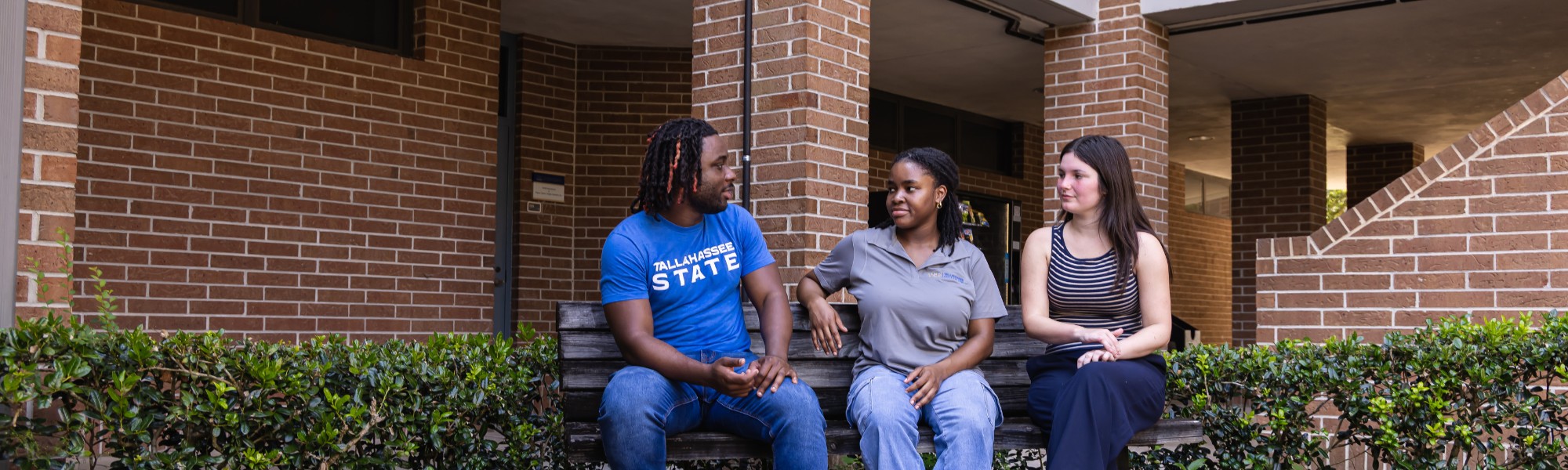 Students chatting outside between classes.