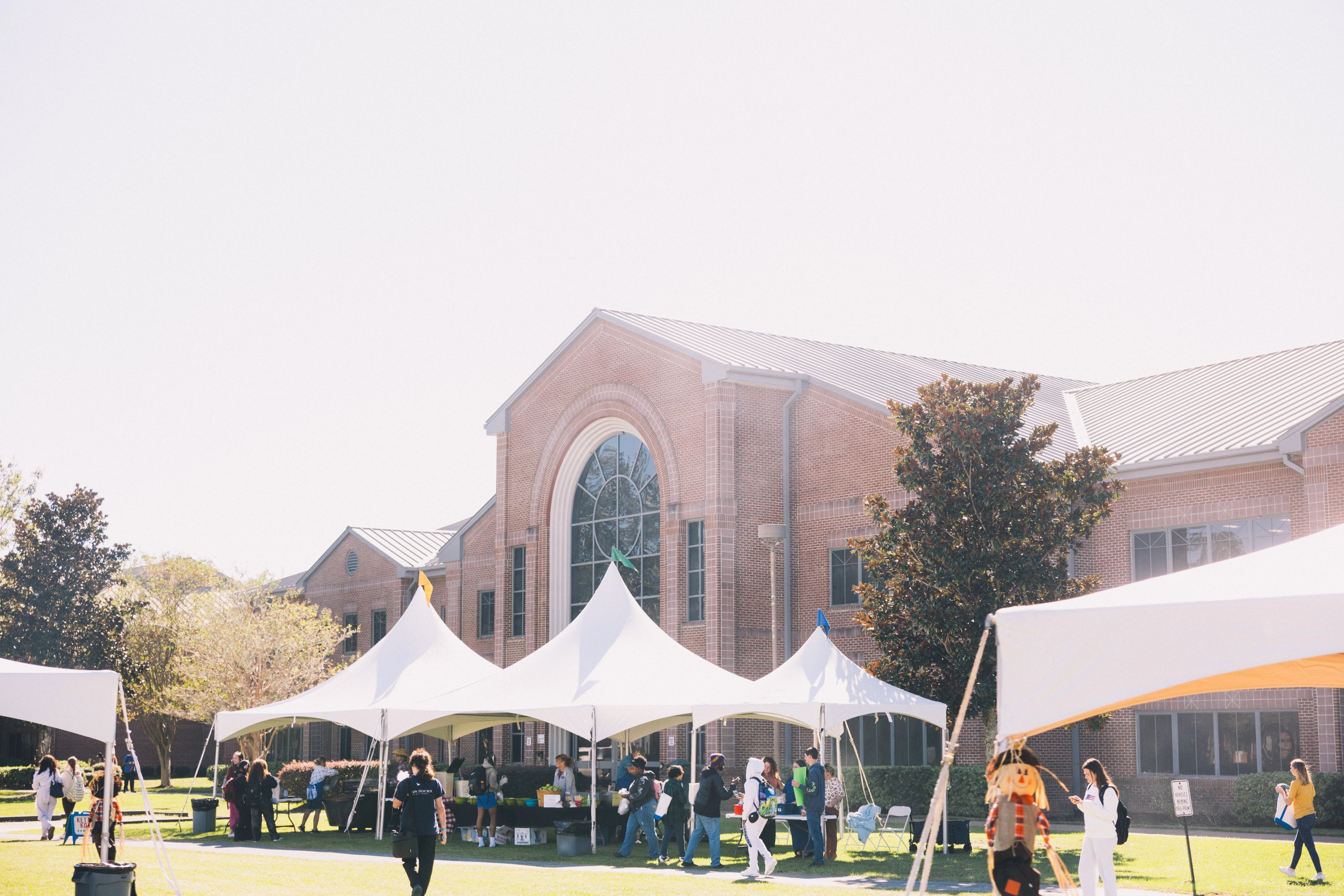 Students and faculity outside TSC buildings