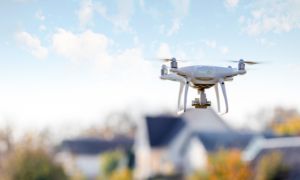 Drone flying over a neighborhood.